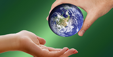 a person's hand passing a small sized Earth to another person's hand. 