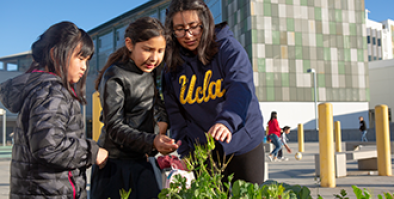 Kids working in a community garden