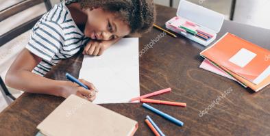 girl writing in notebook