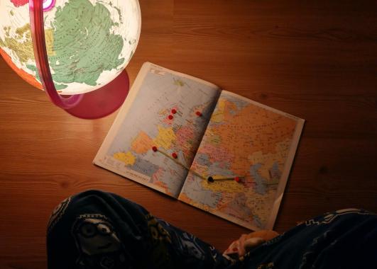 Image of a map and a globe